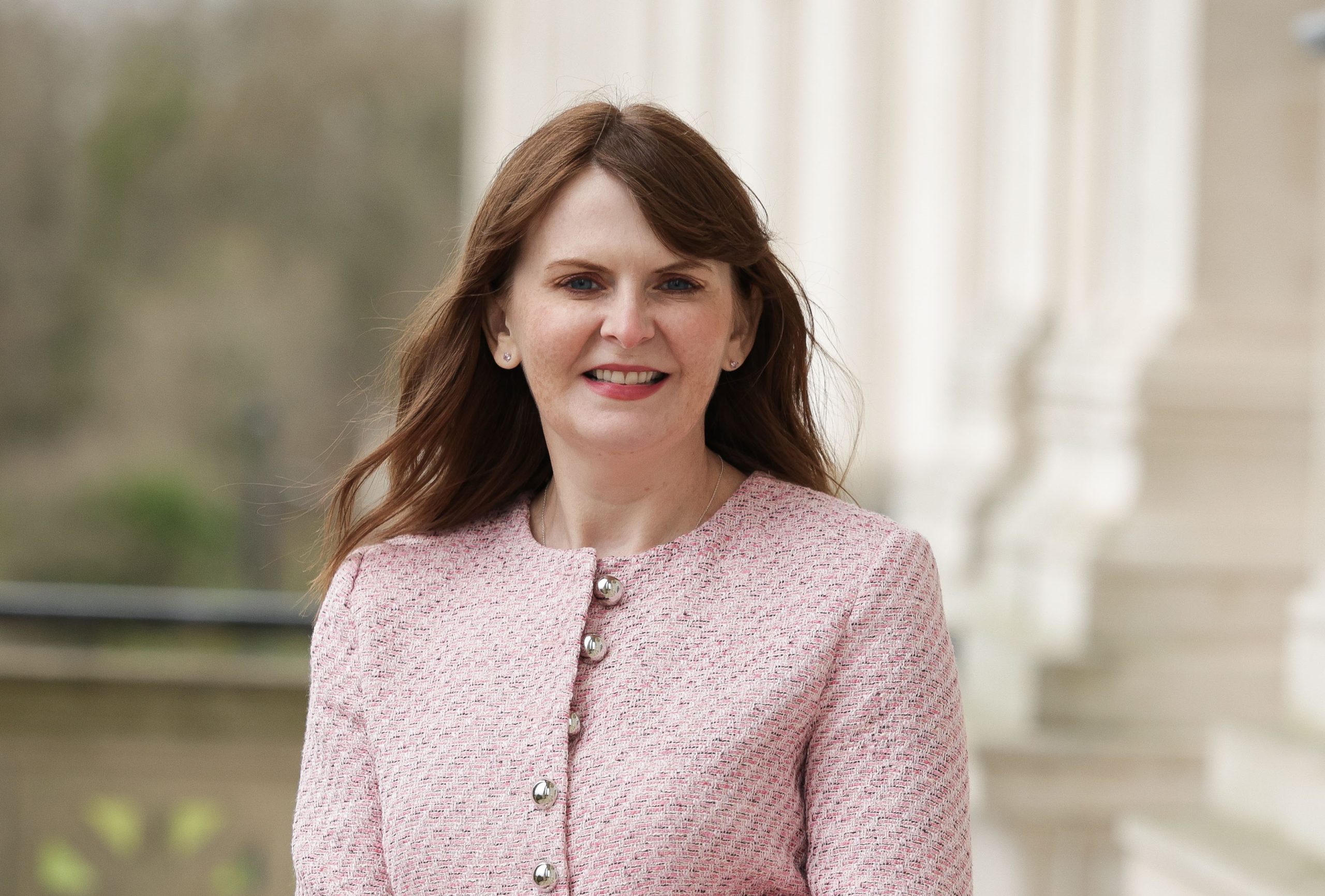 Dr Archibald in pink jacket